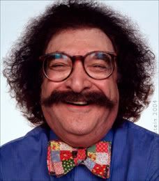 Honey, why are there all these pictures of Gene Shalit on my phone?