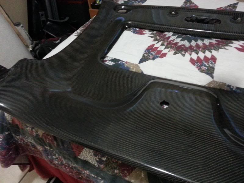 http://i74.photobucket.com/albums/i261/Razuuk004/Carbon%20Fiber/20130618_200640.jpg