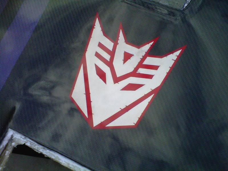 http://i74.photobucket.com/albums/i261/Razuuk004/Carbon%20Fiber/Decepticon.jpg